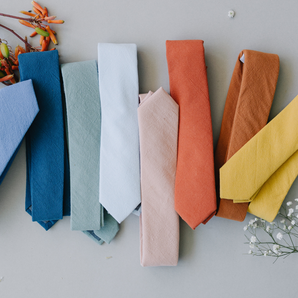 DAZI Solid Color Ties next to each other. Blues, greens, pinks, oranges and yellows.