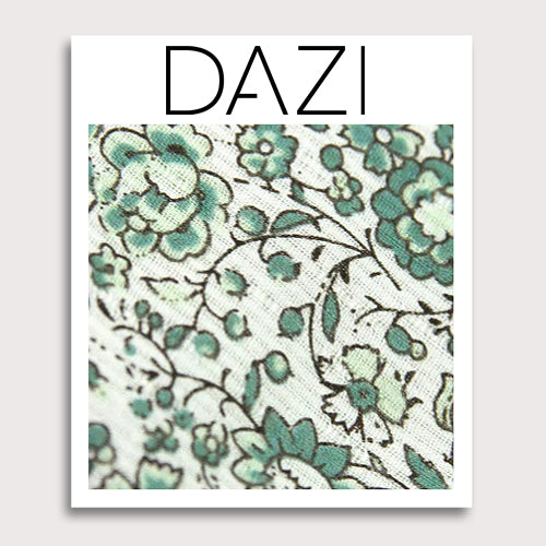 Hidden Garden Fabric Swatch Sample. 3" x 4" fabric sample on cardstock. White background with sage green flowers and leaves with black vines.