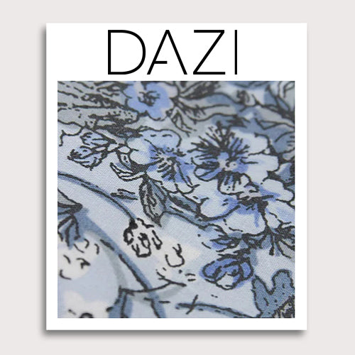 Indie Skye Fabric Swatch Sample. 3" x 4" fabric sample on cardstock. Dusty blue background with white, blue, black and gray floral leaf pattern.