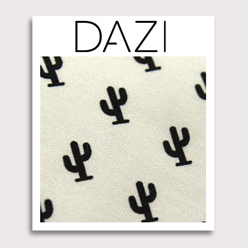 Saguaro Fabric Swatch Sample. 3" x 4" fabric sample on cardstock. Cream background with small black cactus images all over the tie.