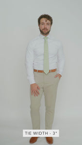 Groovy 3" Wide Standard Tie worn with a white shirt, brown belt and tan suit pants.