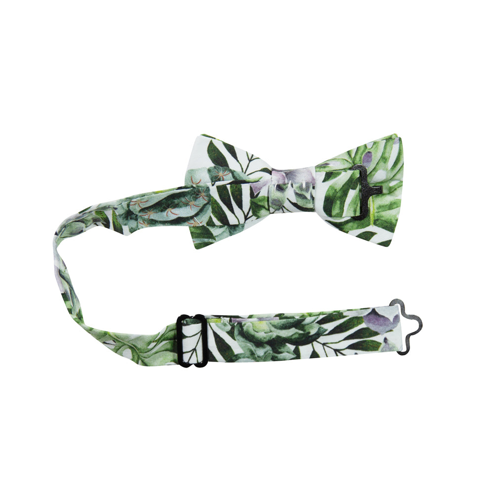 Aloe Pre-Tied Bow Tie with adjustable neck strap. White background with big green succulents and leaves, and also purple succulents.