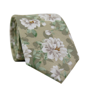 Alyssum Skinny Tie. Light sage green background with medium white flowers and green leaves patterned throughout.