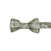 Alyssum Pre-Tied Bow Tie. Light sage green background with medium white flowers and green leaves patterned throughout.