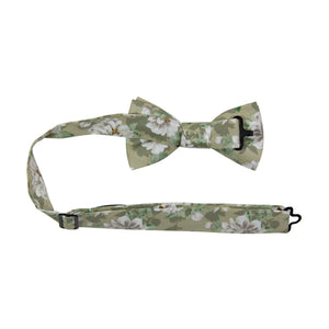 Alyssum Pre-Tied Bow Tie with adjustable neck strap. Light sage green background with medium white flowers and green leaves patterned throughout.