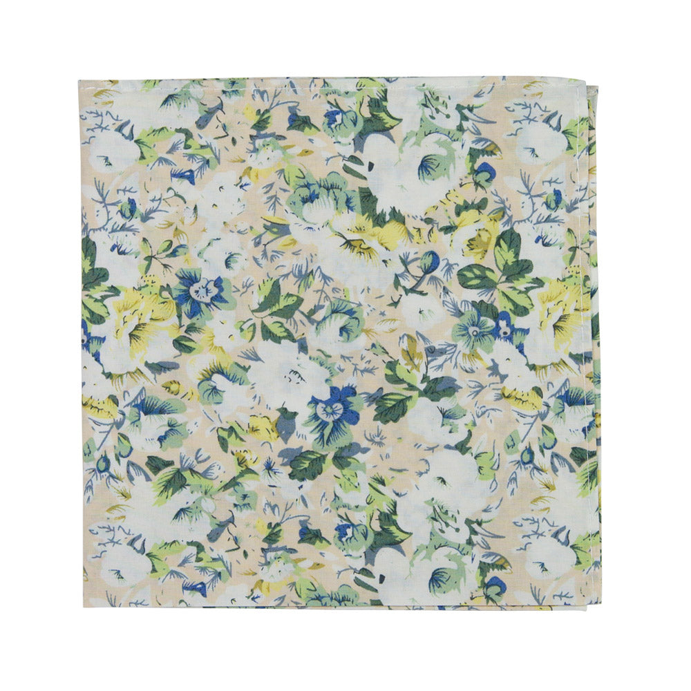 Antiquity Pocket Square. Off-white cream background with a variety of white, sage green, yellow gold and light navy blue flowers scattered throughout.