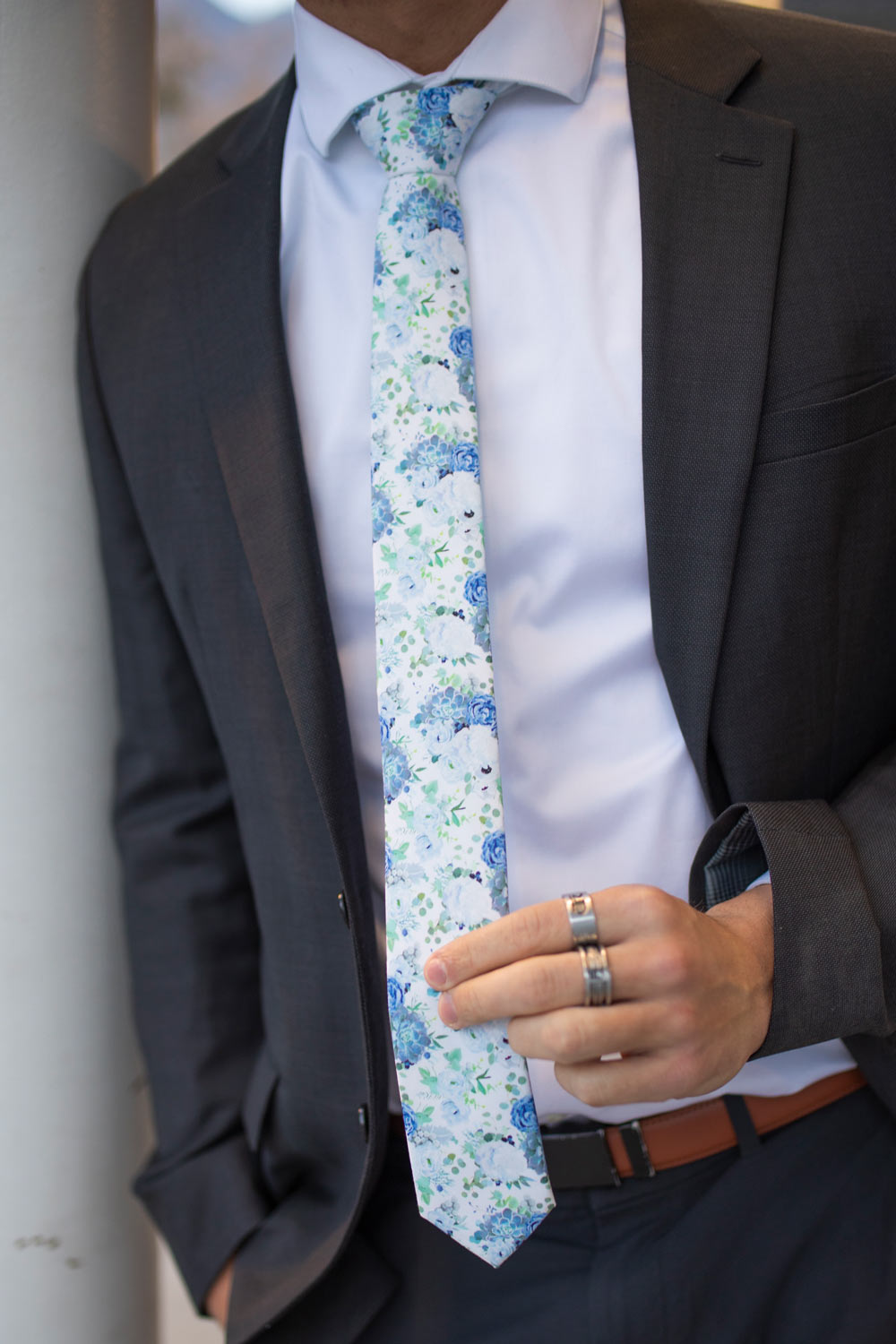 Arctic Ice tie worn with a white shirt and black suit.