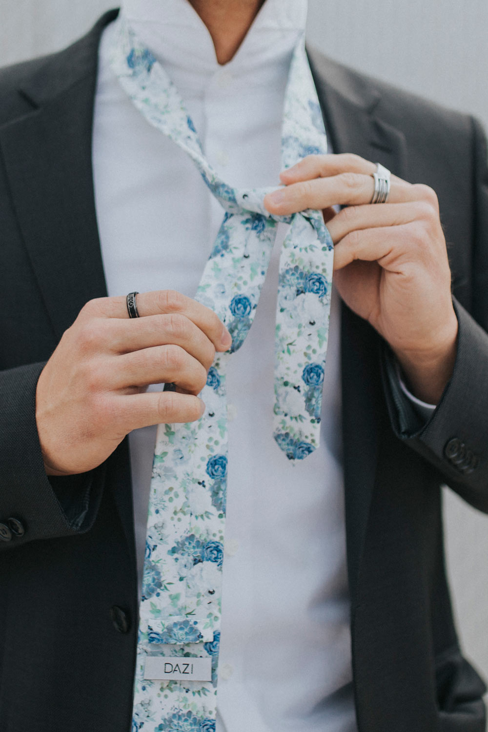 Arctic Ice tie worn with a white shirt and black suit jacket.