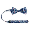 Atlanta Pre-Tied Bow Tie with adjustable neck strap. Navy background with small dusty blue, white, and blush pink flowers.