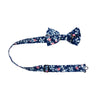 Atlanta Pre-Tied Bow Tie with adjustable neck strap. Navy background with small dusty blue, white, and blush pink flowers.