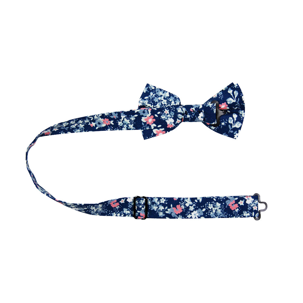 Atlanta Pre-Tied Bow Tie with adjustable neck strap. Navy background with small dusty blue, white, and blush pink flowers.