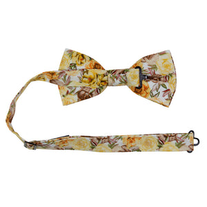 Autumn Cascade Pre-Tied Bow Tie with adjustable neck strap. White background with a tight pattern of yellow gold, orange, and tan brown flowers throughout.