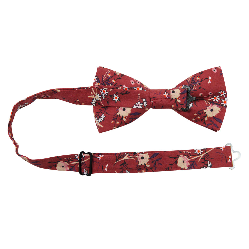Autumn Pre-Tied Bow Tie with adjustable neck strap. Red background with tan, peach and white flowers with black stems and leaves.