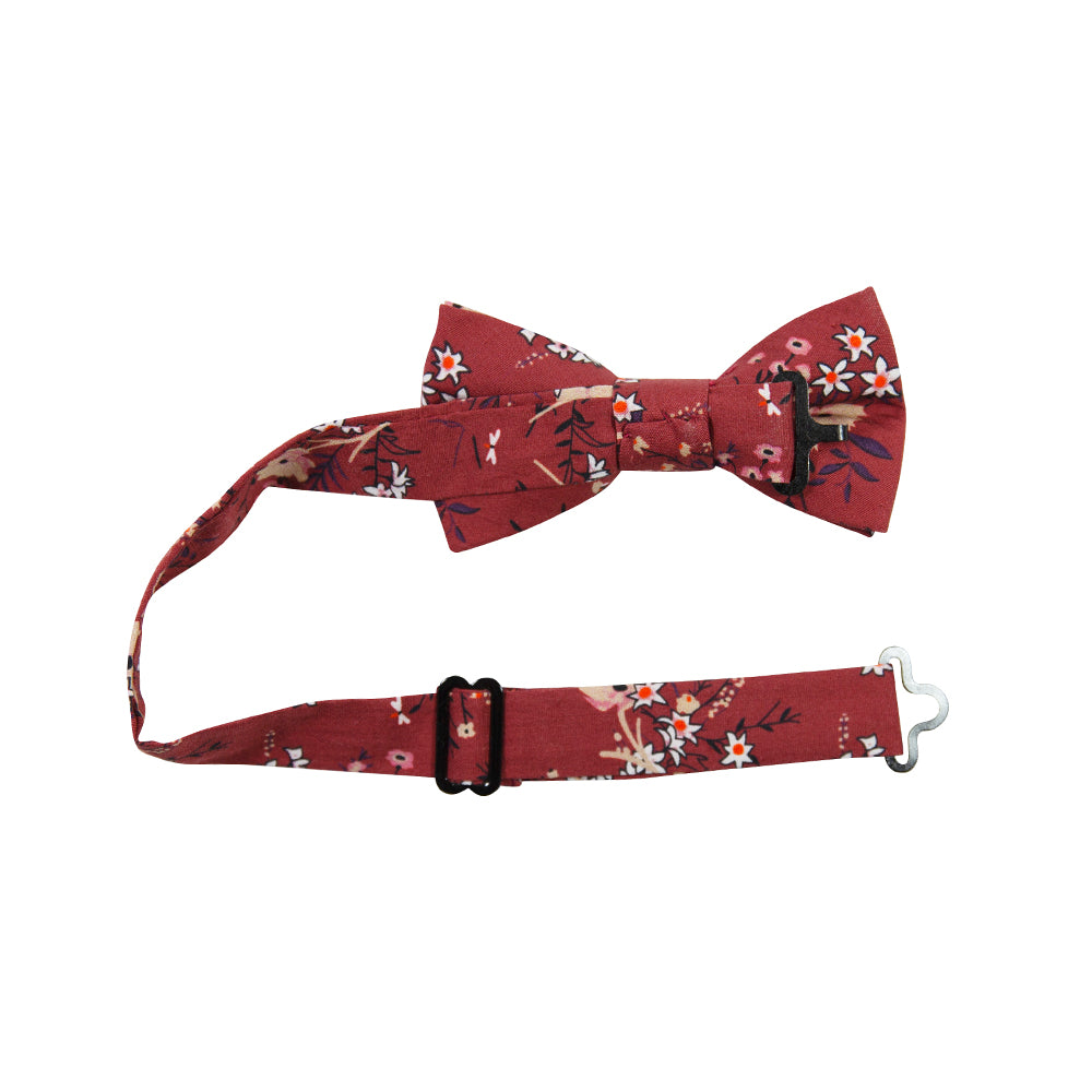 Autumn Pre-Tied Bow Tie with adjustable neck strap. Red background with tan, peach and white flowers with black stems and leaves.