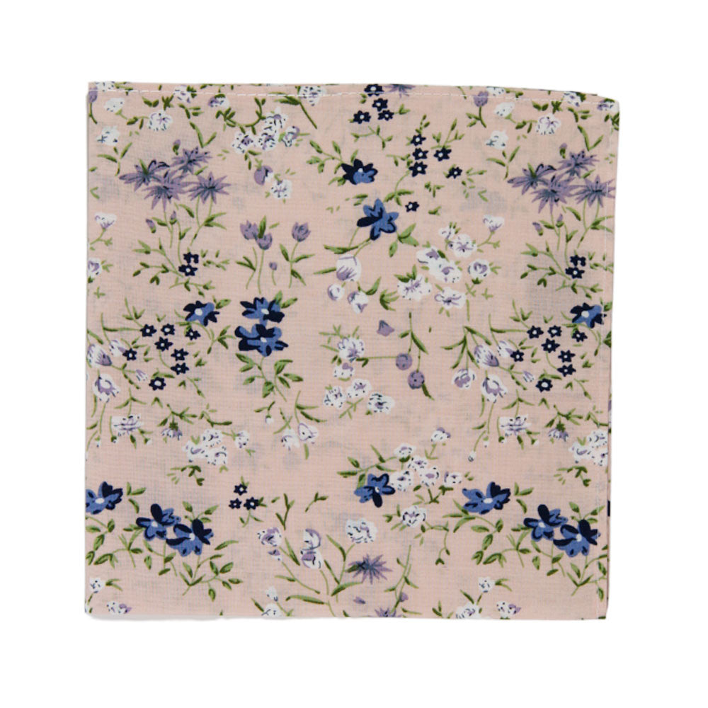 Babys Breath Pocket Square. Blush background with blue, white and lavender flowers, with green leaves and stems.