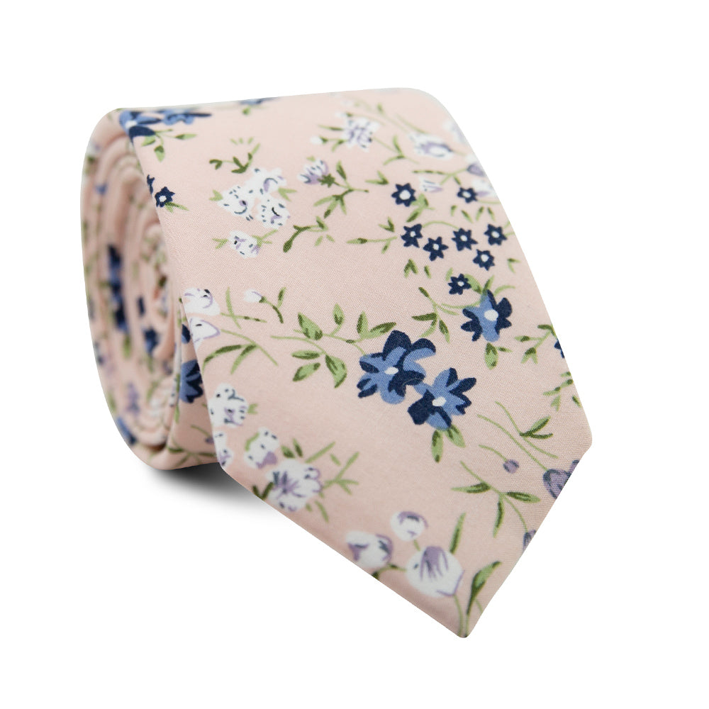 Babys Breath Skinny Tie. Blush background with blue, white and lavender flowers, with green leaves and stems.