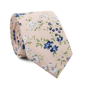 Baby's Breath Skinny Tie. Blush background with blue, white and lavender flowers, with green leaves and stems.