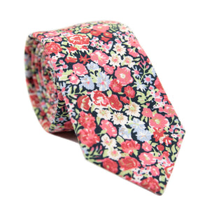 Bed of Roses Skinny Tie. Navy blue background with pink, red, white and lavender flowers and green leaves.