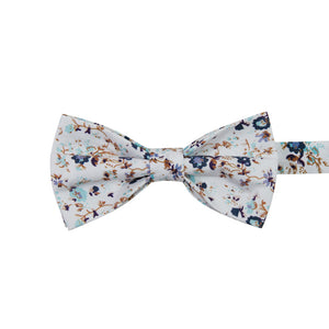 Blue Bloom Pre-Tied Bow Tie. White background, navy and light blue flowers, brown branches.