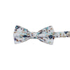 Blue Bloom Pre-Tied Bow Tie. White background, navy and light blue flowers, brown branches.