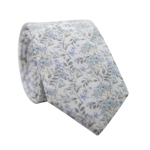 Bluebell Skinny Tie. White background with small dusty blue flowers and sage green stems and leaves throughout.