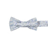 Bluebell Pre-Tied Bow Tie. White background with small dusty blue flowers and sage green stems and leaves throughout.