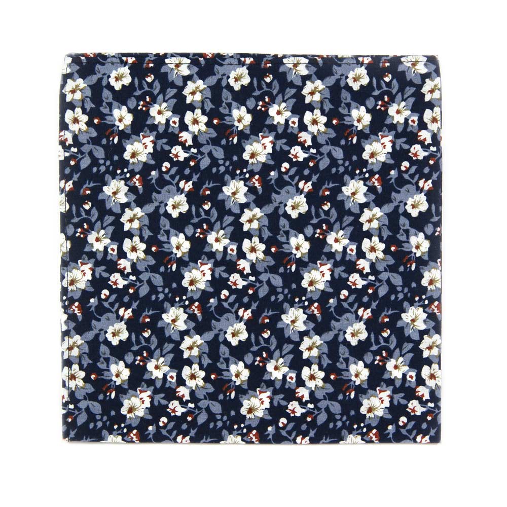 Blueberry Bliss Pocket Square. Navy background, light blue leaves, and small white flowers with a little red center.