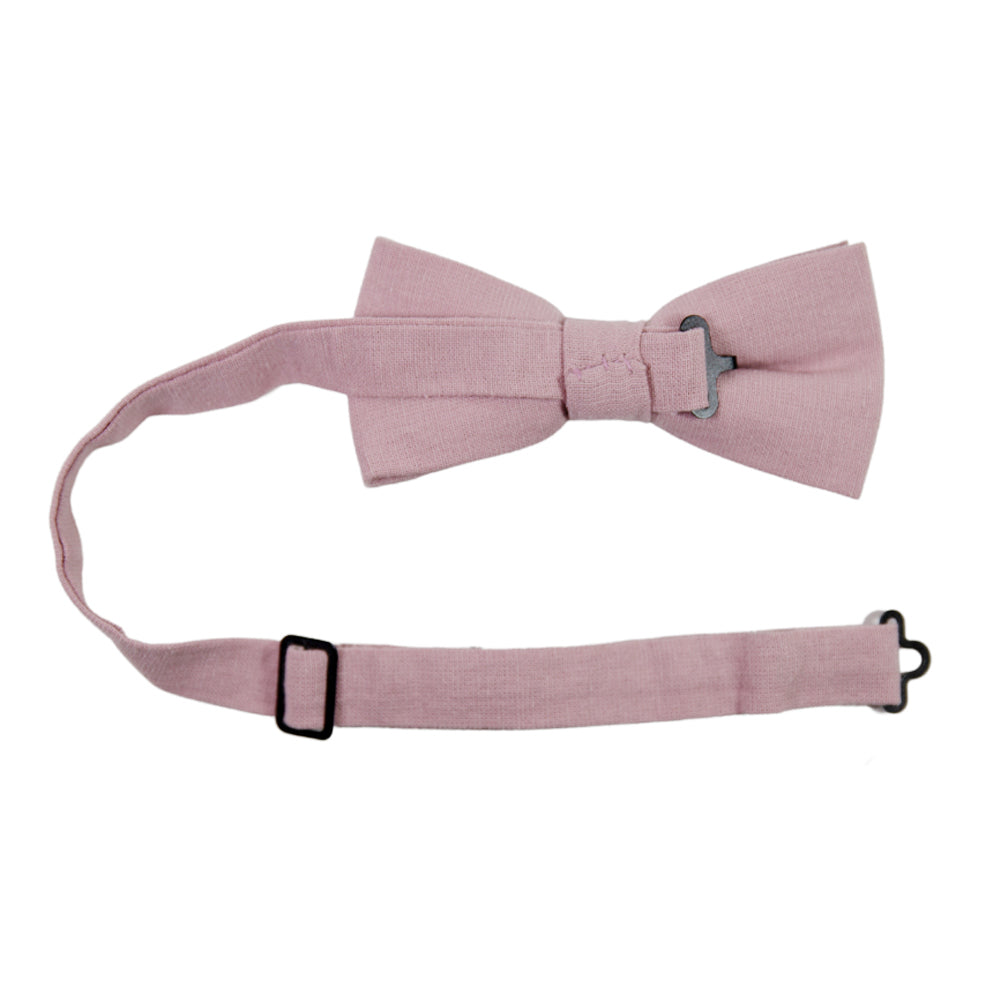 Blush Pre-Tied Bow Tie with adjustable neck strap. Solid blush pink textured fabric.