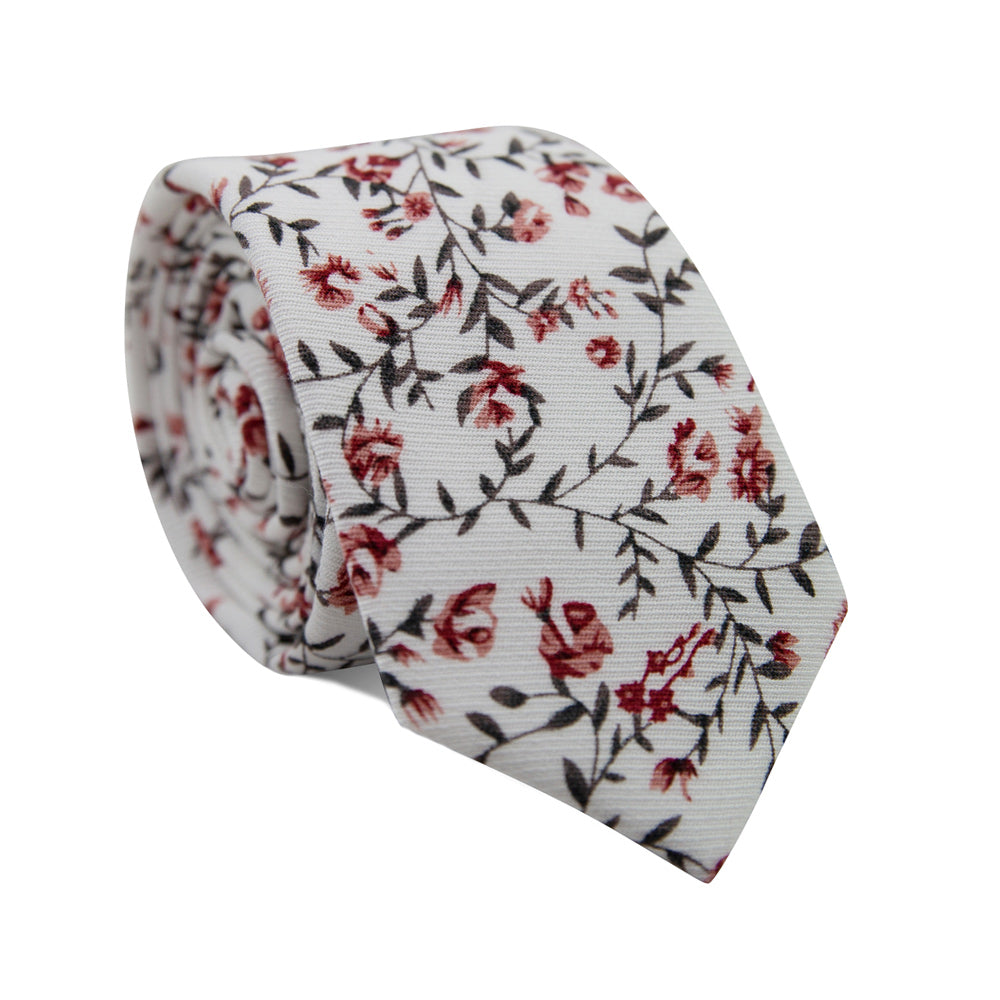 Burning Brush Skinny Tie. White background with small red flowers and green leafy vines throughout.
