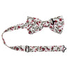 Burning Brush Pre-Tied Bow Tie with adjustable neck strap. White background with small red flowers and green leafy vines throughout.