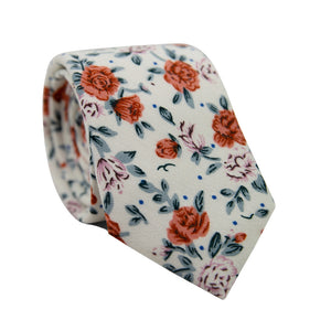Citrus Skinny Tie. Off white background with pink and orange flowers and light gray leaves throughout.