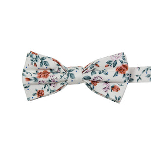 Citrus Pre-Tied Bow Tie. Off white background with pink and orange flowers and light gray leaves throughout.