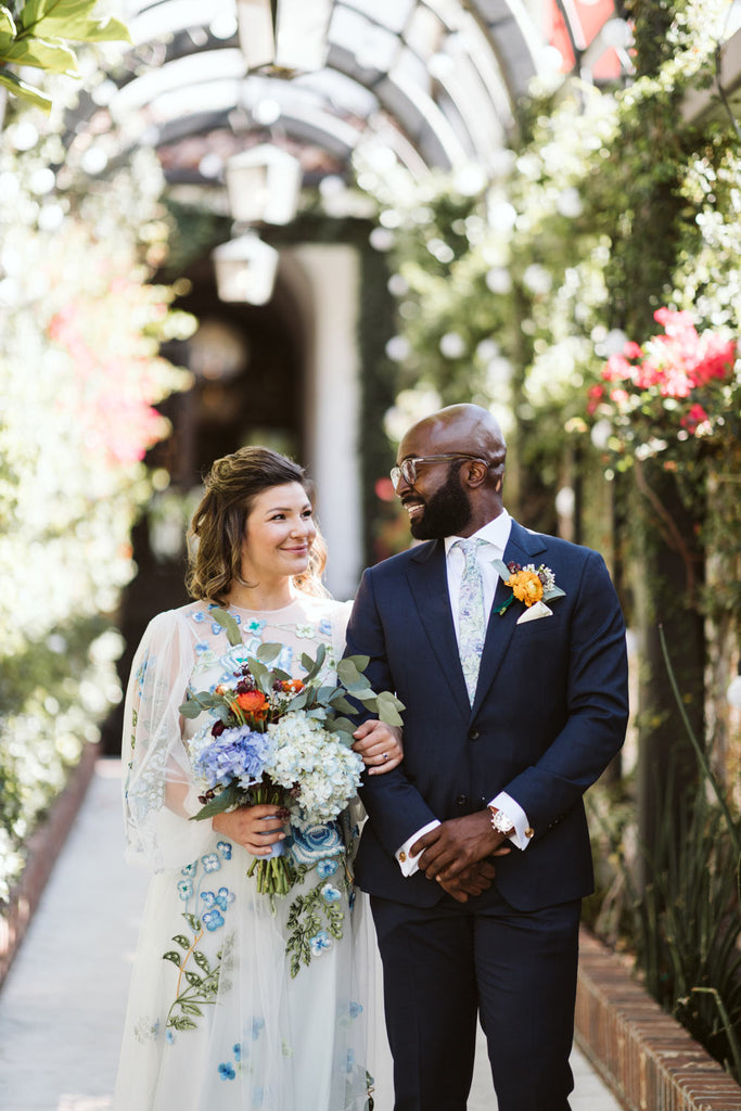 Crested Sunburst tie worn with a white shirt, blue suit jacket and blue pants at a wedding.