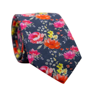 Daybreak Skinny Tie. Navy blue background with pink, orange and yellow flowers throughout. 