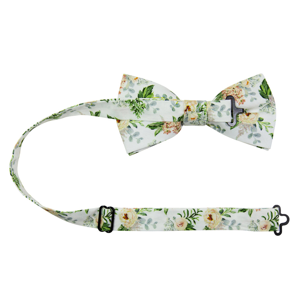 Desert Sun Pre-Tied Bow Tie with adjustable neck strap. White background with round yellow flowers, green and silver leaves. 