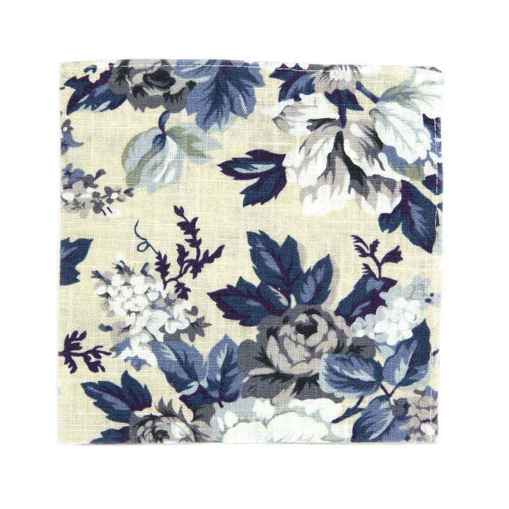 Dreamy Fields Pocket Square. Cream background with dusty blue, white and gray flowers with navy blue and purple leaves.