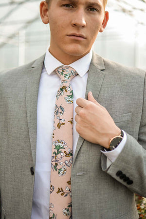 Dusty Lily tie worn with white shirt and gray suit jacket.