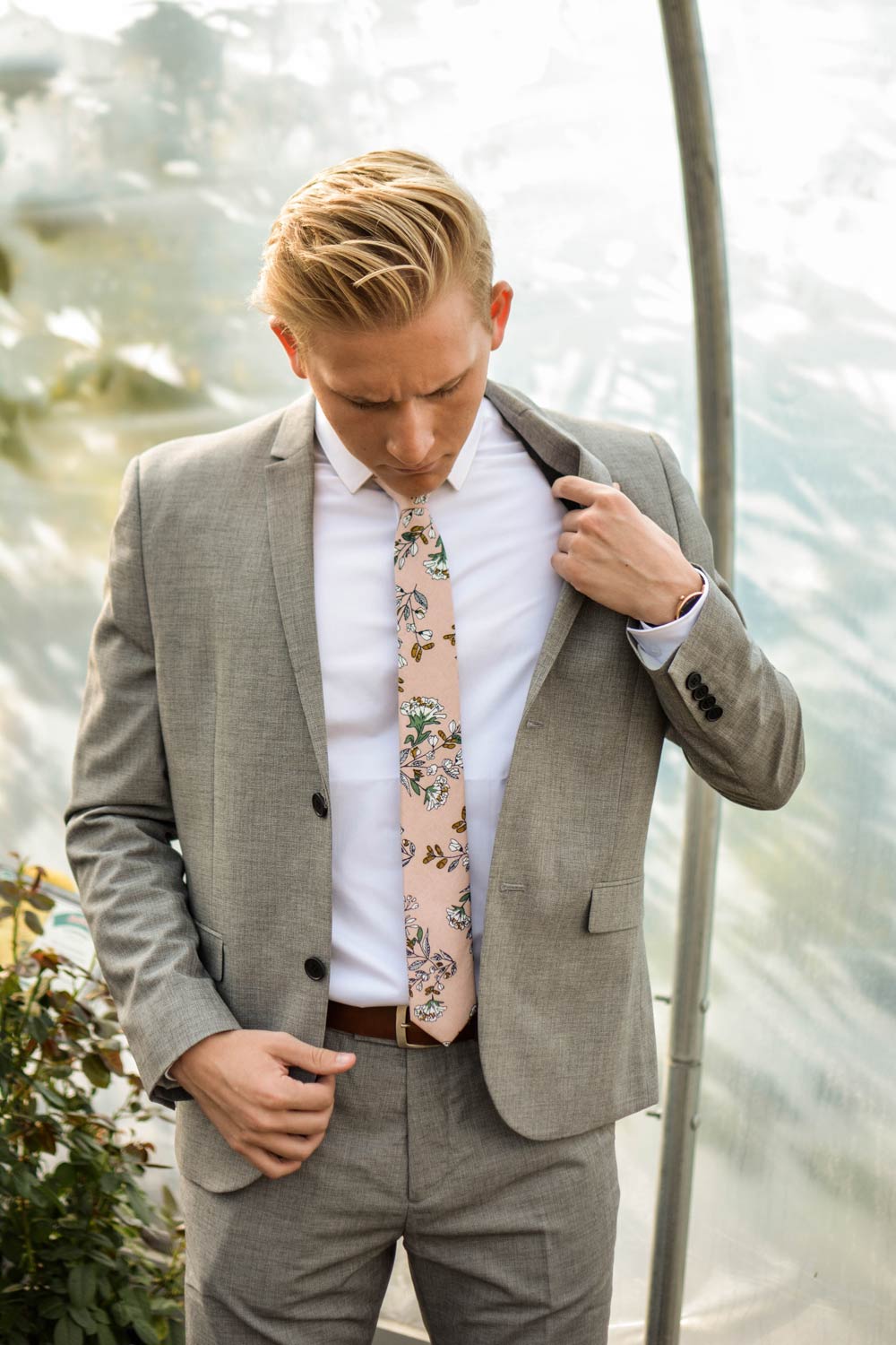 Dusty Lily tie worn with white shirt and gray suit.