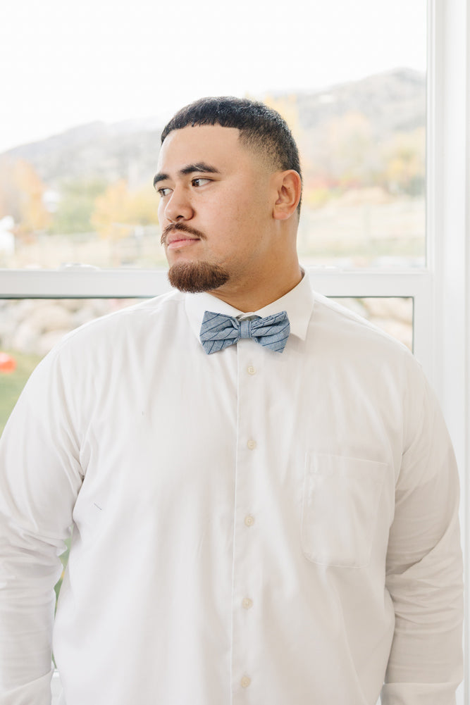 East Coast pre-tied bow tie worn with a white shirt.