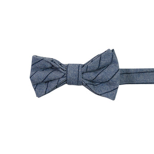 East Coast Stripe Pre-Tied Bow Tie. Dusty blue textured background with thin navy diagonal stripes.