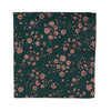 Evergreen Floral Pocket Square. Green background with small blush pink flowers throughout.