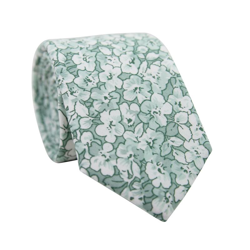 Feelin Lucky Floral Skinny Tie. Entire tie is covered with medium sized white and mint green flowers.