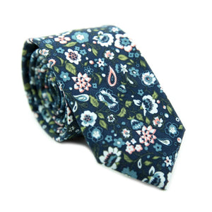 First Date skinny tie. Navy background with white, blue and peach flowers. Also has green leaves and some paisley design. 