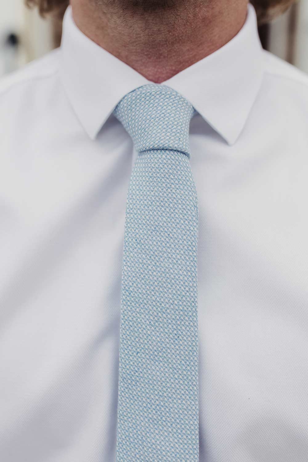 Frosted Morning tie worn with a white shirt.