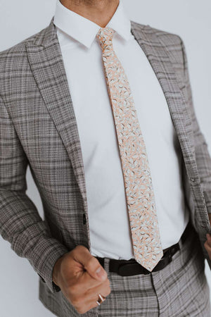 Georgia Belle Tie worn with a white shirt, black belt and gray plaid suit.