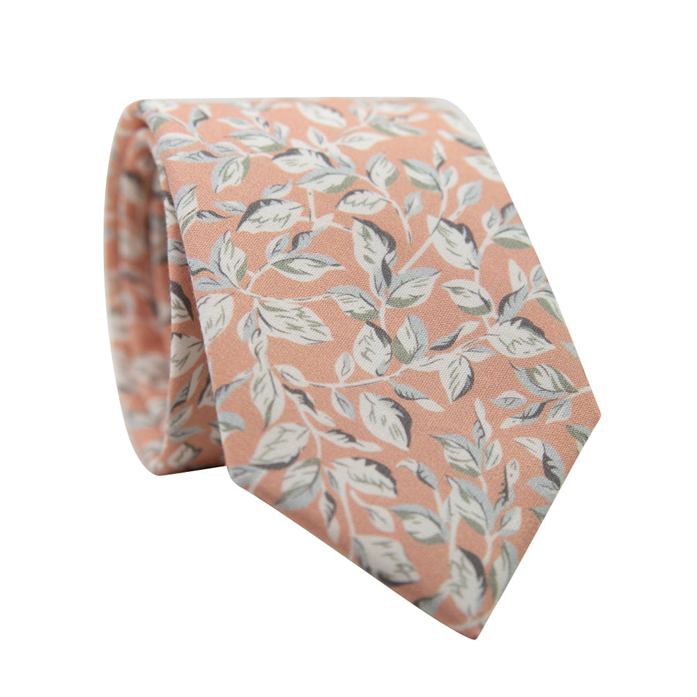 Georgia Belle Skinny Tie. Peach background with dusty blue and sage green leaves and white stems and leaves. 