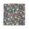 Green Floral Pocket Square. Green background with white and orange flowers and green stems and leaves.