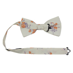 Harvest Blossom Pre-Tied Bow Tie with adjustable neck strap. Cream or off white background with medium size orange flowers and lavender purple leaves and stems.