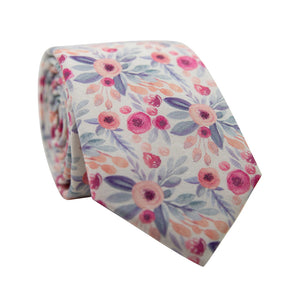 Hermosa Skinny Tie. Cream/off white background with pink and peach circular flowers and blue and green leaves throughout.