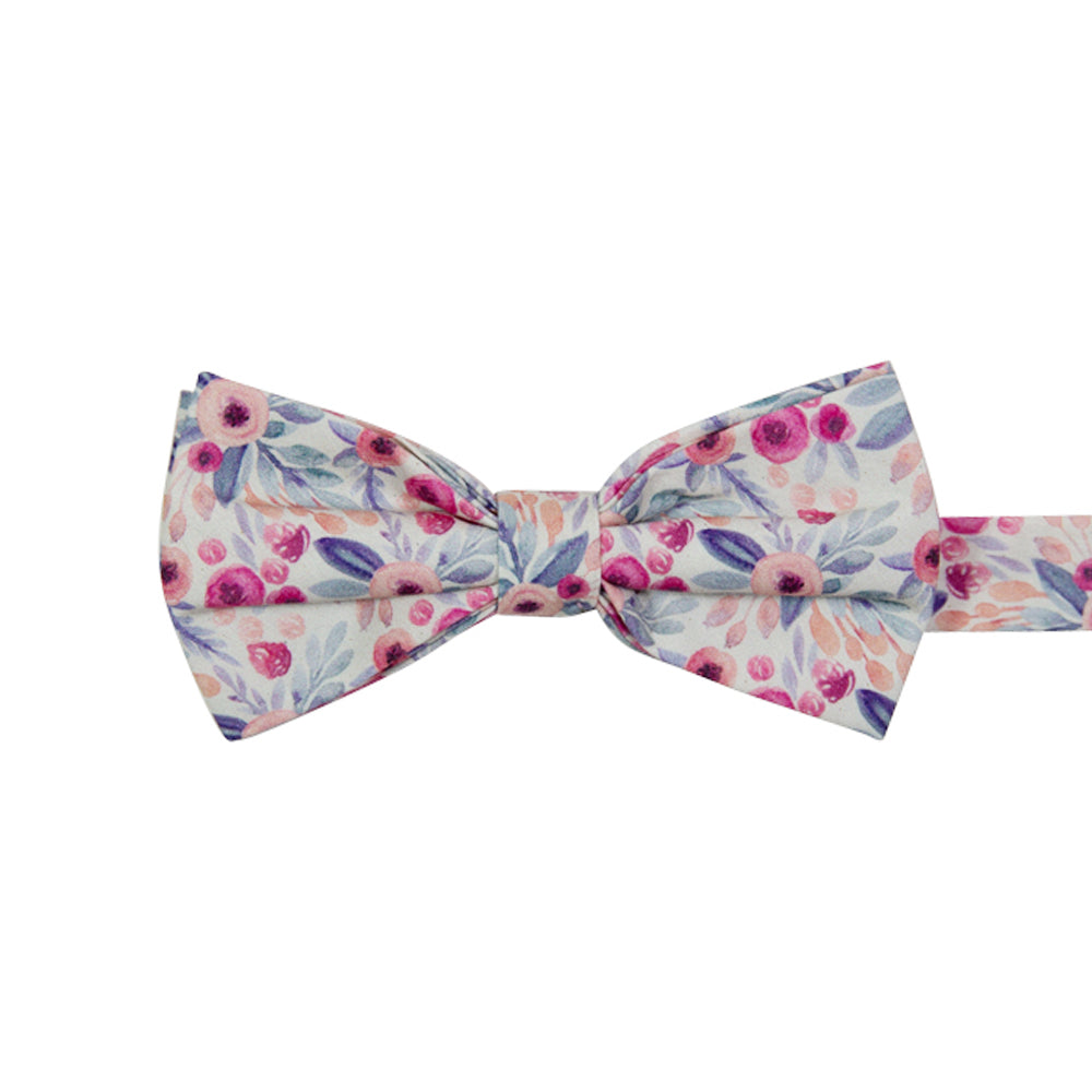 Hermosa Pre-Tied Bow Tie. Cream/off white background with pink and peach circular flowers and blue and green leaves throughout.